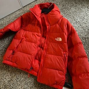 North Face Jacket with hood; sits at waist; brand new with tags!